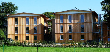 [vícepodlažní dřevostavba pro sociální bydlení]