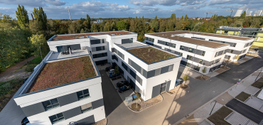 [administrativní centrum - vícepatrové dřevostavby]